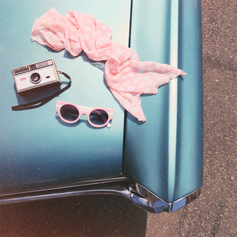 vintage scarf | vintage sunglasses | retro sunglasses | polka dot scarf | vintage camera | vintage car 